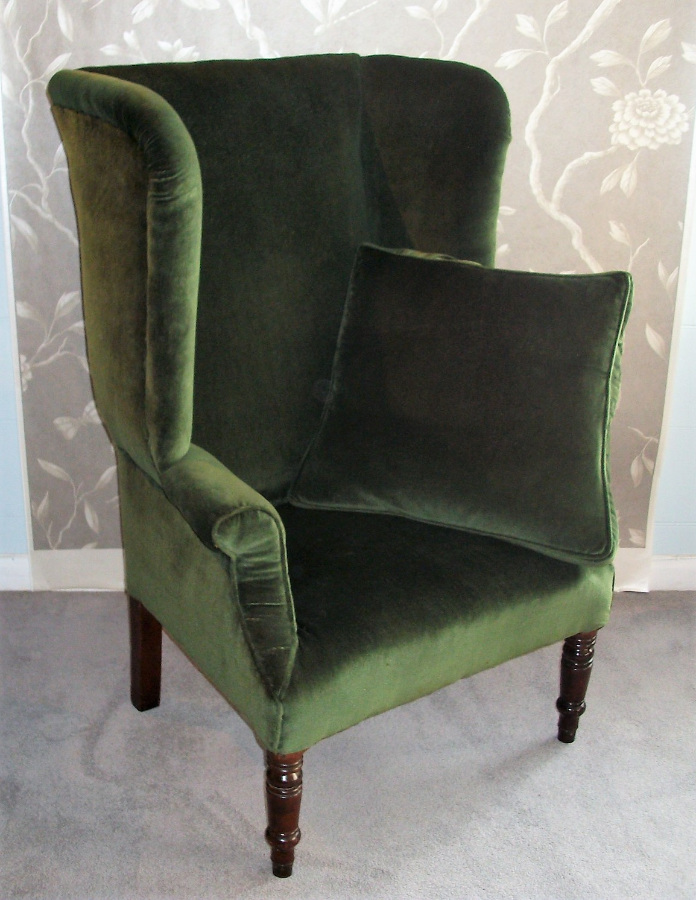 antique wing back armchair